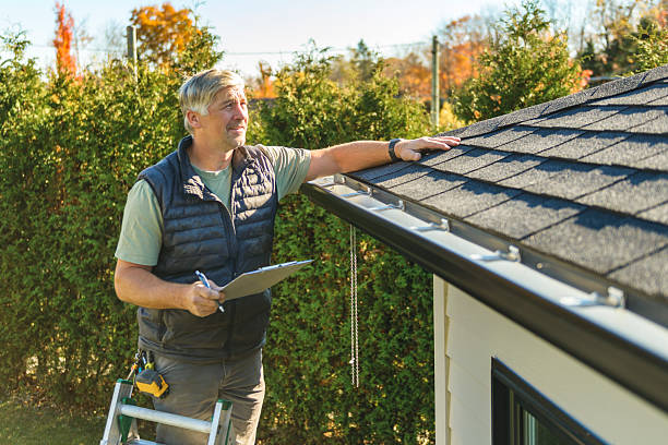 Professional Hail Damage Roof Repair technician working in Moscow, ID